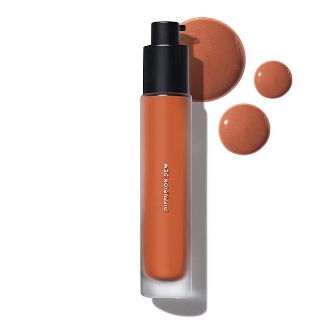 MAKE Beauty Diffusion Dew Skin Tint. Sheer to Medium Coverage Radiant Finish. Blurring, Smoothing, and Brightening for Glowing Complexion. Enhanced with Niacinamide and Adenosine. Bronze 14